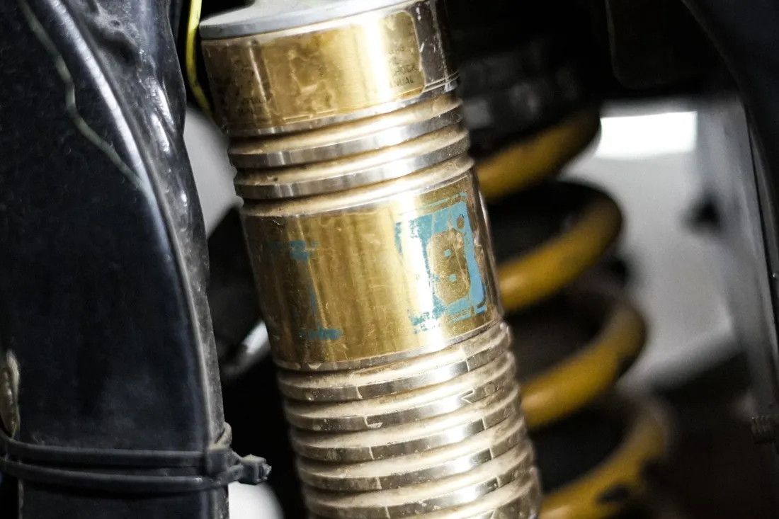 Close view of a suspension spring and shock absorber